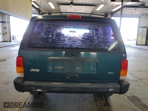 1997 Jeep Cherokee SE with VIN 1J4FJ28S0VL551442, listed as a Copart auction lot 49215195 with 164,356 mi miles and Salvage Title. Bid and sale history available at carsss.com. Image 6.
