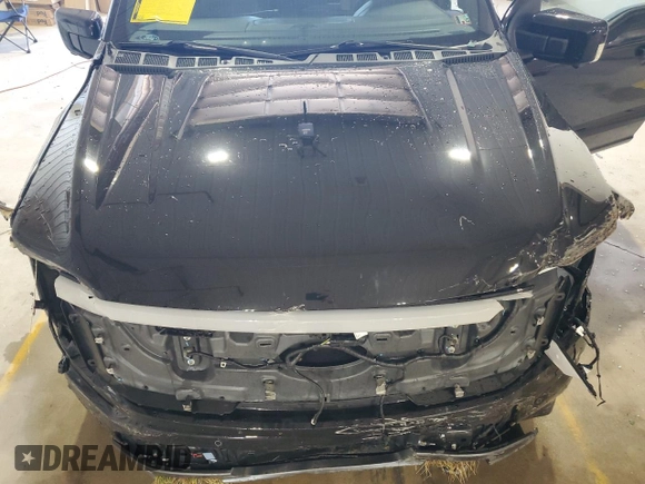 2023 Ford F-150 Lightning Pro z VIN 1FTVW1EV0PWG06971, wystawiony jako Copart lot #61850635 z przebiegiem 32 388 mil mil oraz Szkoda całkowita • Salvage title. Historia ofert i sprzedaży dostępna na DreamBid. Obrazek 11.