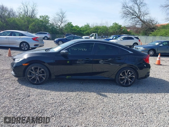 2019 Honda Civic Sport with VIN 19XFC2F86KE045495, listed as a IAAI auction lot 42074631 with 52,864 mi miles and . Bid and sale history available at DreamBid. Image 15.