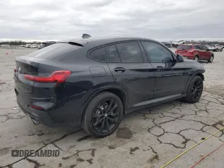 2020 BMW X4 xDrive30i z VIN 5UX2V1C00LLZ32454, wystawiony jako Copart lot #50051205 z przebiegiem 63 213 mil mil oraz Tytuł czysty. Historia ofert i sprzedaży dostępna na DreamBid. Obrazek 3.