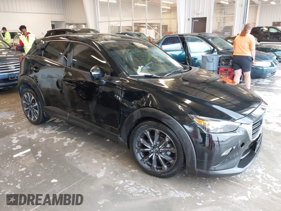 2019 Mazda CX-3 Touring z VIN JM1DKDC70K0404219, wystawiony jako IAAI lot #42148454 z przebiegiem 80 539 mil mil oraz . Historia ofert i sprzedaży dostępna na DreamBid. Obrazek 1.