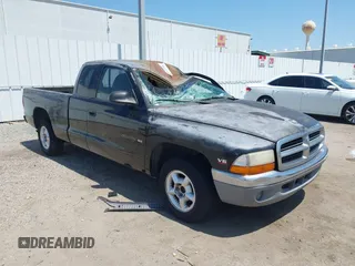 1997 Dodge Dakota z VIN 1B7GL23X2VS306266, wystawiony jako IAAI lot #41985485 z przebiegiem 171 311 mil mil oraz . Historia ofert i sprzedaży dostępna na DreamBid. Obrazek 1.