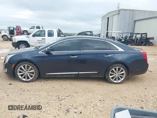 2013 Cadillac XTS Luxury with VIN 2G61P5S39D9182526, listed as a IAAI auction lot 42183995 with 132,778 mi miles. Bid and sale history available at carsss.com. Image 14.