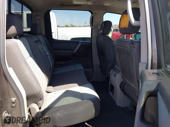 2004 Nissan Titan LE with VIN 1N6AA07A94N532546, listed as a IAAI auction lot 42103434 with 197,461 mi miles and . Bid and sale history available at DreamBid. Image 8.