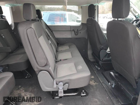 2023 Ford Transit Passenger XL z VIN 1FBAX2YG7PKA45212, wystawiony jako Copart lot #42914795 z przebiegiem 70 987 mil mil oraz Szkoda całkowita • Salvage title. Historia ofert i sprzedaży dostępna na DreamBid. Obrazek 11.