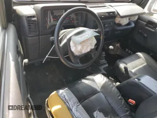 2004 Jeep Wrangler Sport with VIN 1J4FA49S44P788467, listed as a Copart auction lot 55395625 with 187,289 mi miles and Salvage title. Bid and sale history available at DreamBid. Image 8.