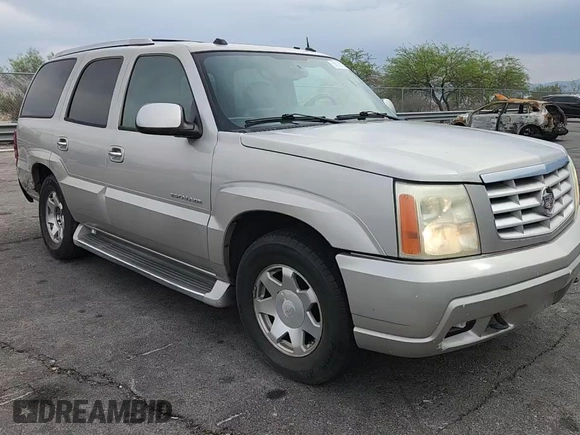 2004 Cadillac Escalade z VIN 1GYEC63T64R285823, wystawiony jako Copart lot #59167915 z przebiegiem 289 955 mil mil oraz Szkoda całkowita • Salvage title. Historia ofert i sprzedaży dostępna na DreamBid. Obrazek 14.