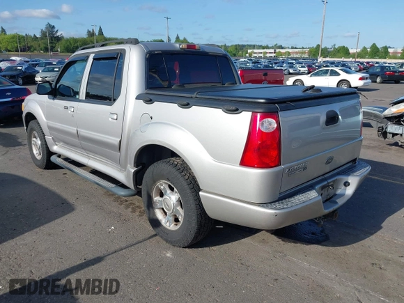 2004 Ford Explorer Sport Trac XLS z VIN 1FMDU77K74UB69268, wystawiony jako IAAI lot #42055157 z przebiegiem 127 573 mil mil oraz . Historia ofert i sprzedaży dostępna na DreamBid. Obrazek 3.