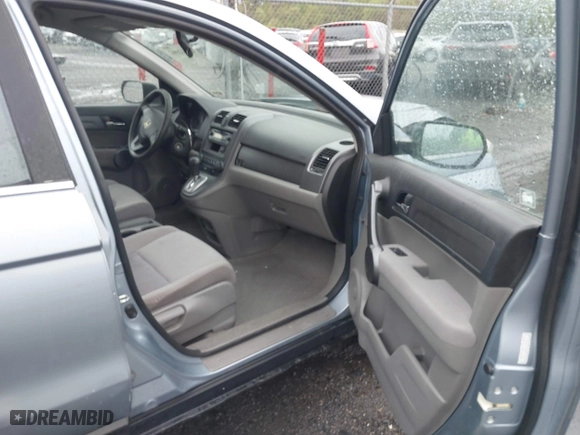 2008 Honda CR-V LX with VIN 5J6RE48328L048201, listed as a IAAI auction lot 42012002 with 166,876 mi miles. Bid and sale history available at carsss.com. Image 5.