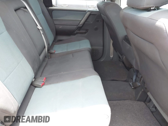 2005 Nissan Titan LE z VIN 1N6AA07A65N504074, wystawiony jako IAAI lot #42667004 z przebiegiem 230 687 mil mil oraz . Historia ofert i sprzedaży dostępna na DreamBid. Obrazek 8.