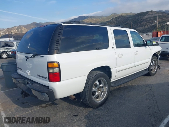 2004 Chevrolet Suburban LS with VIN 1GNEC16TX4J107987, listed as a IAAI auction lot 42086720 with 191,033 mi miles and . Bid and sale history available at DreamBid. Image 4.