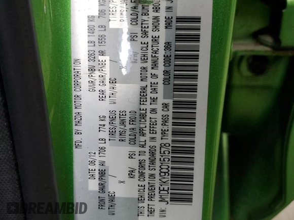2012 Mazda 2 Sport with VIN JM1DE1KY9C0151578, listed as a Copart auction lot 52625055 with 123,812 mi miles and Salvage Title. Bid and sale history available at DreamBid. Image 13.