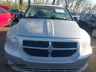 2009 Dodge Caliber SXT z VIN 1B3HB48A79D103215, wystawiony jako IAAI lot #41973831 z przebiegiem 134 797 mil mil oraz . Historia ofert i sprzedaży dostępna na DreamBid. Obrazek 12.