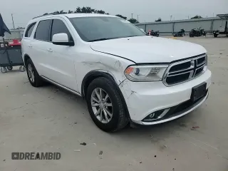 2018 Dodge Durango SXT with VIN 1C4RDHAG0JC329075, listed as a Copart auction lot 56966855 with 176,403 mi miles and Salvage title. Bid and sale history available at DreamBid. Image 14.