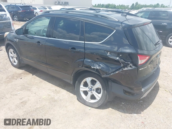 2013 Ford Escape SE with VIN 1FMCU9GX0DUC42483, listed as a IAAI auction lot 42549857 with 138,028 mi miles and . Bid and sale history available at DreamBid. Image 3.