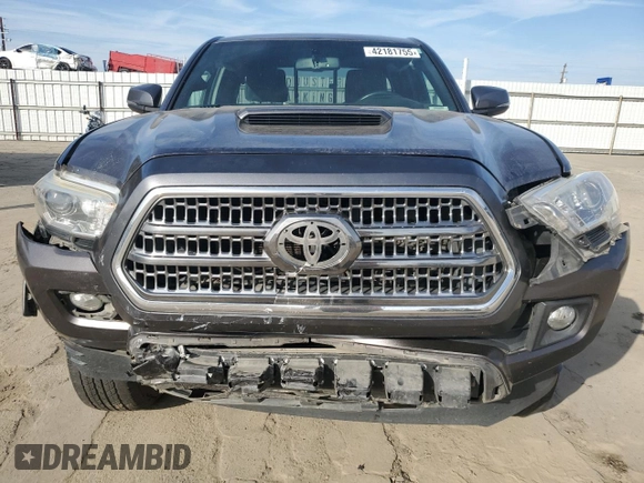 2017 Toyota Tacoma SR5 z VIN 5TFRZ5CN6HX034934, wystawiony jako Copart lot #42181755 z przebiegiem 176 511 mil mil oraz Szkoda całkowita • Salvage title. Historia ofert i sprzedaży dostępna na DreamBid. Obrazek 5.