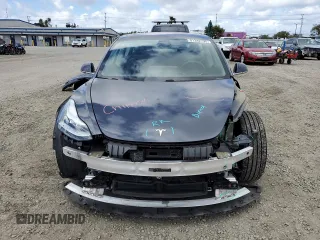 2019 Tesla Model 3 Mid Range with VIN 5YJ3E1EA1KF298858, listed as a Copart auction lot 51342795 with 118,050 mi miles and Salvage Title. Bid and sale history available at carsss.com. Image 5.