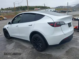 2020 Tesla Model Y Long Range with VIN 5YJYGDEE2LF022484, listed as a IAAI auction lot 41798662 with 108,978 mi miles and . Bid and sale history available at DreamBid. Image 3.