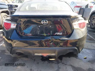 2015 Scion FR-S z VIN JF1ZNAA18F8705683, wystawiony jako IAAI lot #42178113 z przebiegiem 124 775 mil mil oraz . Historia ofert i sprzedaży dostępna na DreamBid. Obrazek 16.