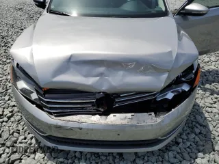 2012 Volkswagen Passat SE z VIN 1VWBP7A30CC025860, wystawiony jako Copart lot #56124875 z przebiegiem 146 207 mil mil oraz Szkody całkowita. Historia ofert i sprzedaży dostępna na DreamBid. Obrazek 11.