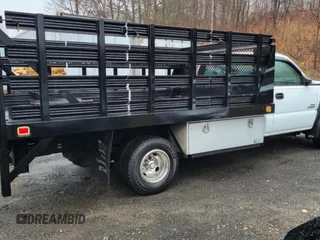 2007 Chevrolet Silverado 1500 with VIN 1GBJC34D67E167779, listed as a Copart auction lot 52091775 with 166,218 mi miles and Clean Title. Bid and sale history available at DreamBid. Image 4.