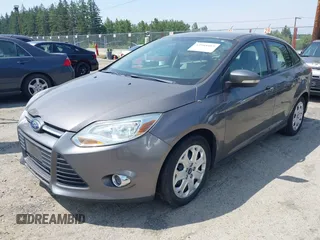 2012 Ford Focus SE with VIN 1FAHP3F25CL260962, listed as a IAAI auction lot 42588485 with 143,679 mi miles and . Bid and sale history available at DreamBid. Image 2.