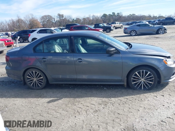 2016 Volkswagen Jetta Sport z VIN 3VWD17AJXGM302382, wystawiony jako IAAI lot #41441854 z przebiegiem 131 569 mil mil oraz . Historia ofert i sprzedaży dostępna na DreamBid. Obrazek 13.