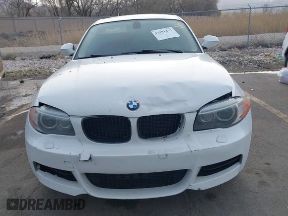2013 BMW 1 Series 135i with VIN WBAUC9C52DVM13628, listed as a IAAI auction lot 41901475 with 113,598 mi miles and . Bid and sale history available at DreamBid. Image 12.