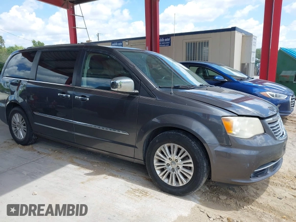 2015 Chrysler Town & Country Limited Platinum with VIN 2C4RC1GG9FR528125, listed as a IAAI auction lot 41925382 with 126,796 mi miles. Bid and sale history available at carsss.com. Image 13.