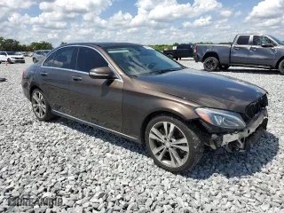 2015 Mercedes-Benz C-Class C 300 Luxury with VIN 55SWF4KB8FU041323, listed as a Copart auction lot 50857205 with 104,869 mi miles and Salvage Title. Bid and sale history available at carsss.com. Image 4.