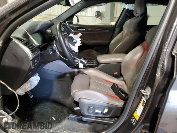 2022 BMW X4 M z VIN 5YM23EC05N9J23246, wystawiony jako Copart lot #48730835 z przebiegiem Nie podano mil oraz Szkoda całkowita • Salvage title. Historia ofert i sprzedaży dostępna na DreamBid. Obrazek 7.