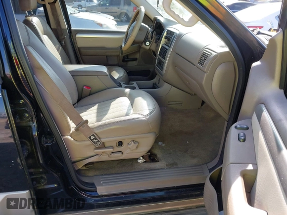 2003 Mercury Mountaineer Convenience z VIN 4M2DU66W13ZJ05239, wystawiony jako IAAI lot #42062881 z przebiegiem 292 631 mil mil oraz . Historia ofert i sprzedaży dostępna na DreamBid. Obrazek 5.