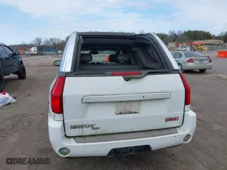 2004 GMC Envoy XUV SLE with VIN 1GKES12S846143483, listed as a IAAI auction lot 41500608 with 242,926 mi miles. Bid and sale history available at carsss.com. Image 6.