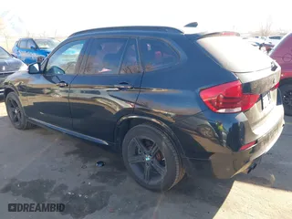 2014 BMW X1 xDrive28i with VIN WBAVL1C58EVY11143, listed as a IAAI auction lot 41396236 with 115,667 mi miles. Bid and sale history available at carsss.com. Image 3.