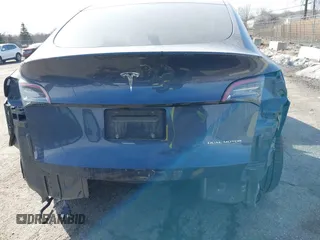 2023 Tesla Model Y Performance with VIN 7SAYGDEF7PF590750, listed as a IAAI auction lot 41694002 with Not Provided miles and . Bid and sale history available at DreamBid. Image 16.