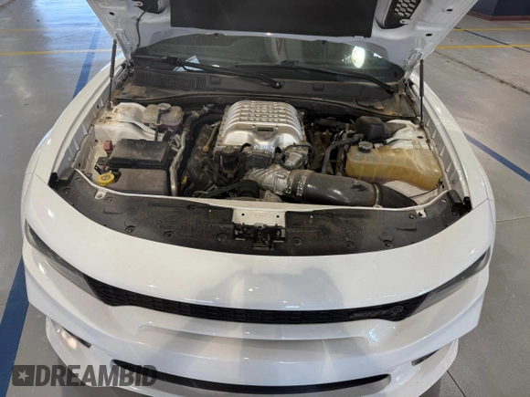 2021 Dodge Charger SRT Hellcat Widebody z VIN 2C3CDXL93MH662407, wystawiony jako Copart lot #58264615 z przebiegiem 56 012 mil mil oraz Czysty tytuł • Clean title. Historia ofert i sprzedaży dostępna na DreamBid. Obrazek 7.