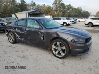 2018 Dodge Charger SXT Plus with VIN 2C3CDXHG4JH135849, listed as a Copart auction lot 50755575 with 187,904 mi miles and Salvage Title. Bid and sale history available at carsss.com. Image 4.