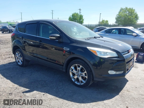 2013 Ford Escape SEL with VIN 1FMCU9H97DUA51529, listed as a IAAI auction lot 42164245 with 106,649 mi miles and . Bid and sale history available at DreamBid. Image 1.