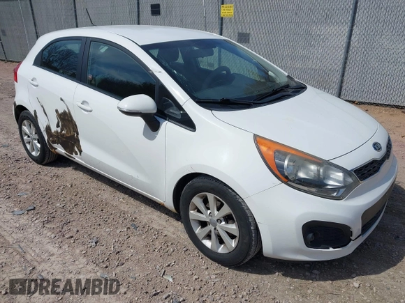 2012 Kia Rio EX with VIN KNADN5A37C6031494, listed as a IAAI auction lot 42052186 with 141,765 mi miles. Bid and sale history available at carsss.com. Image 1.