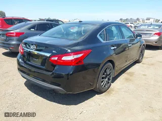 2017 Nissan Altima 2.5 SR with VIN 1N4AL3AP9HC151928, listed as a IAAI auction lot 42020334 with 136,101 mi miles. Bid and sale history available at carsss.com. Image 4.