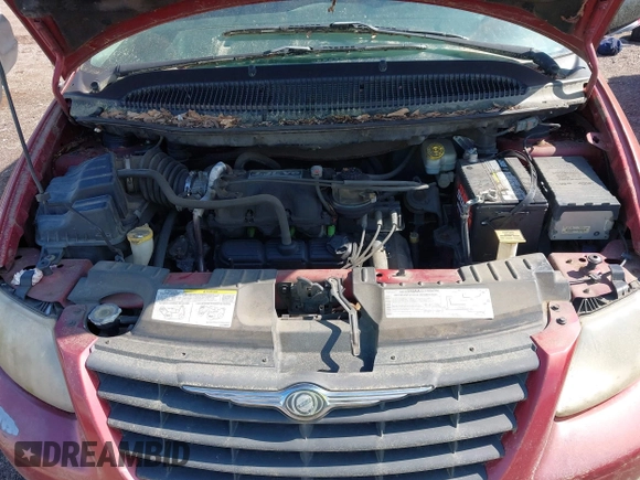 2006 Chrysler Town & Country SWB with VIN 1A4GP45R76B572053, listed as a IAAI auction lot 42015562 with 310,509 mi miles. Bid and sale history available at carsss.com. Image 10.
