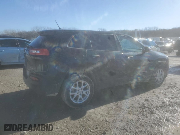 2014 Jeep Cherokee Sport with VIN 1C4PJLAB7EW279562, listed as a Copart auction lot 85054634 with 134,516 mi miles and Salvage Title. Bid and sale history available at DreamBid. Image 3.