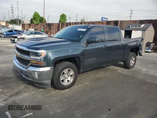 2017 Chevrolet Silverado 1500 LT with VIN 3GCPCREH6HG364570, listed as a Copart auction lot 52647185 with 132,473 mi miles and Salvage Title. Bid and sale history available at DreamBid. Image 1.