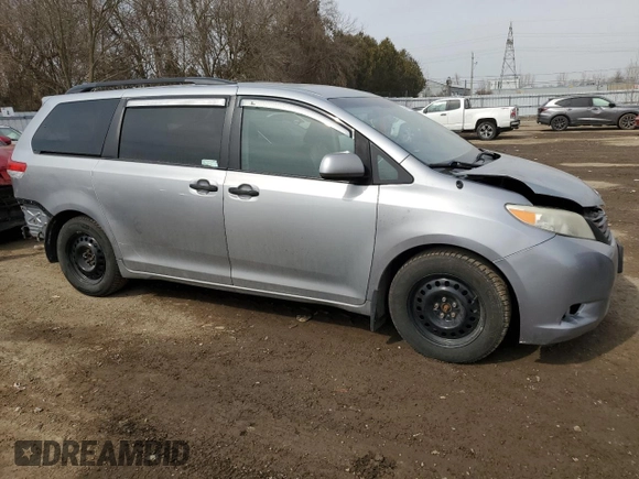 2014 Toyota Sienna L with VIN 5TDZK3DC7ES489962, listed as a Copart auction lot 48117985 with 329,366 mi miles and Clean Title. Bid and sale history available at carsss.com. Image 4.