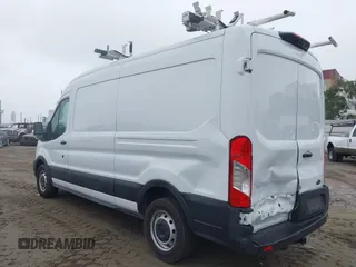 2021 Ford Transit Cargo with VIN 1FTBR1C88MKA52816, listed as a IAAI auction lot 41620731 with 60,716 mi miles and . Bid and sale history available at DreamBid. Image 6.