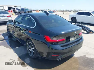 2019 BMW 3 Series 330i with VIN WBA5R1C51KFH09402, listed as a IAAI auction lot 41869138 with 59,115 mi miles and . Bid and sale history available at DreamBid. Image 3.