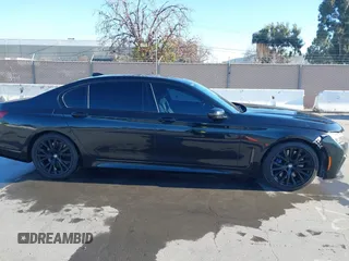 2022 BMW 7 Series 740i with VIN WBA7T2C02NCJ33925, listed as a IAAI auction lot 41377788 with 143,684 mi miles and . Bid and sale history available at carsss.com. Image 13.