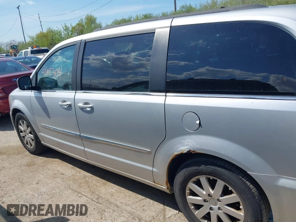2011 Chrysler Town & Country Touring L with VIN 2A4RR8DG8BR797653, listed as a IAAI auction lot 42115304 with 185,613 mi miles and . Bid and sale history available at DreamBid. Image 14.