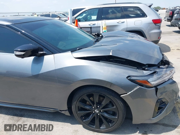 2020 Nissan Maxima SR with VIN 1N4AA6EVXLC383592, listed as a IAAI auction lot 42058071 with 103,014 mi miles and . Bid and sale history available at DreamBid. Image 18.