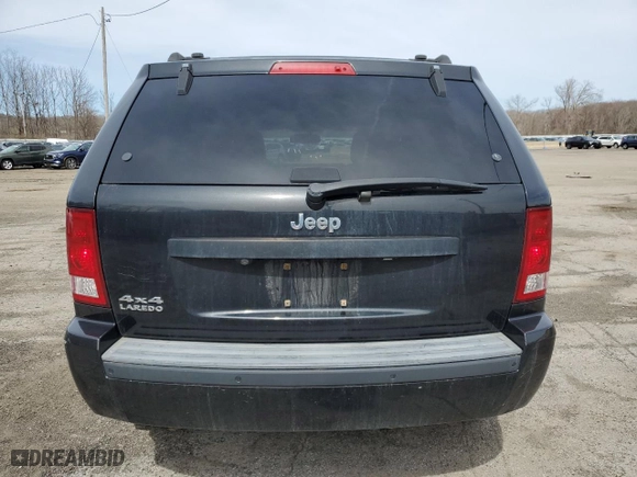 2009 Jeep Grand Cherokee Laredo with VIN 1J8GR48K79C537213, listed as a Copart auction lot 51222395 with 148,838 mi miles and Salvage Title. Bid and sale history available at carsss.com. Image 6.